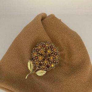 Vintage flower pin, gold and brown stones and gold embossed leaves